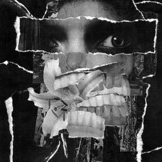 a black and white photo of a woman's face through torn pieces of paper