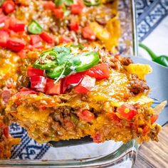 a casserole dish with meat and vegetables on it