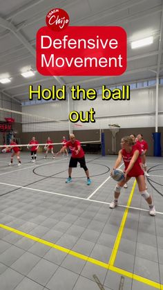 girls in red shirts playing volleyball on an indoor court with the words defensive movement hold the ball out