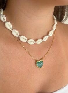 Indulge in the luxurious beauty of our Green Love Stone Necklace. Handcrafted in Jaipur, India, this stunning necklace features a heart-shaped green chalcedony, a semi-precious gemstone known for its calming and healing properties. Elevate your style and energy with this exclusive piece. Chalcedony is a Birthstone of may Green Love, Green Chalcedony, Green Necklace, Fine Jewelry Collection, Small Heart, Stunning Necklace, Summer Jewelry, Healing Properties, Gold Plated Jewelry