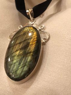 Vintage Silver Genuine Labradorite Gemstone Necklace.
https://www.etsy.com/listing/586270687/vintage-silver-genuine-labradorite Labradorite Large Pendant Jewelry As Gift, Labradorite Necklace With Large Pendant For Gift, Gift Jewelry With Large Labradorite Pendant, Vintage Jewelry Sets, Purple Labradorite, Vintage Jewels, Etsy Jewelry, 925 Sterling Silver Earrings, Silver Pendant Necklace