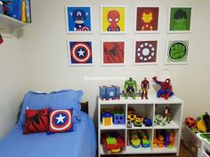 a child's bedroom with captain america pictures on the wall and toys in the bed