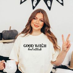 Looking for a cute versatile top to wear this summer? Make sure to grab one of our Good Witch Bad Attitude garment dyed graphic tees! This soft and comfortable graphic tee is the perfect top for any outfit. It can be paired with biker shorts, jeans, or even a simple skirt/dress! This tee is true-to-size, so be sure to order your regular t-shirt size! If you are looking for a more oversized look, make sure to size up! Good Witch, Bad Attitude, Casual Fit, Casual Fits, Heavy Weight, Air Dry, Vintage Looks, Comfort Colors, Sleeve Styles