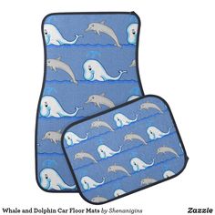 two oven mitts with dolphins on them in the ocean and one has a dolphin