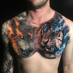 a man with tattoos on his chest has two wolfs painted on it's chest