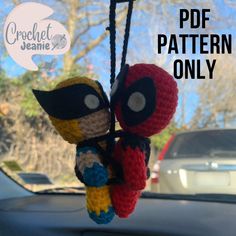 two crocheted deadpools hanging from a car's dash board with the caption free pattern only