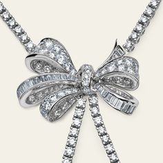 Graff Graduated Double Strand Knot Bow Motif Necklace with White Round and Baguette cut Diamonds Details27 Baguette Diamonds .57ctsColor: Fine White. Clarity: VS+285 Round Diamonds 8.78ctsColor: Fine White. Clarity: VS+TTL 9.35cts Luxury Silver Baguette-cut Diamond Necklace, Luxury Silver Baguette Cut Diamond Necklace, White Gold Baguette Cut Necklaces For Evening, White Gold Baguette Cut Necklace For Evening, Baguette Cut White Gold Necklace For Evening, Luxury Formal Necklaces With Baguette Diamonds, Luxury Baguette Cut Diamond Necklace, Luxury Baguette Diamond Necklaces For Formal Occasions, Luxury Baguette Diamond Necklace For Evening