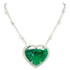 Stunning GRS Certified 8.58 carat heart-shaped natural green emerald gemstone. Sourced from the depths of the earth, this gem embodies the essence of beauty and elegance. this faceted gem showcases the perfect blend of artistry and precision cutting. Its heart shape symbolizes love and affection, making it an ideal choice for those seeking to express their sentiments through exquisite jewelry. The intense to vivid green hue of this gem, aptly named "Spring Green," exudes freshness and vitality, Heart Shaped Diamond Pendant, Blue Sapphire Pendant, Heart Necklace Diamond, Diamond Jewel, Family Jewellery, Emerald Pendant, Heart Shaped Diamond, Heart Shape Pendant, Modern Necklaces