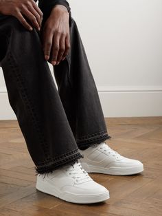 CELINE HOMME's 'CT-07' sneakers are made from white and black leather with durable rubber overlays. Modelled after basketball styles, they're perforated along the toe boxes and sides and finished with signature branded details. Celine Shoes, Sneakers For Men, Mr Porter, White Style, Sneakers White, Luxury Handbags, Leather Sneakers, Top Sneakers, Fashion News