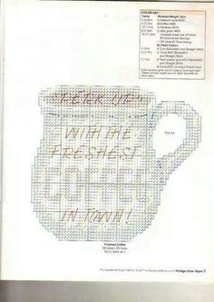 a cross stitch coffee mug with words on it