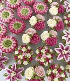 cupcakes decorated with pink and white flowers