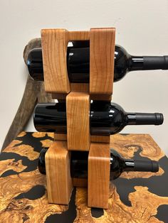 a wine rack made out of wooden blocks