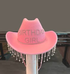 a pink hat with the words birthday girl written on it