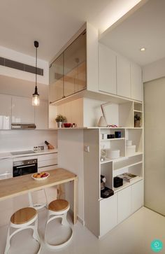 the kitchen is clean and ready to be used as a dining room or office space