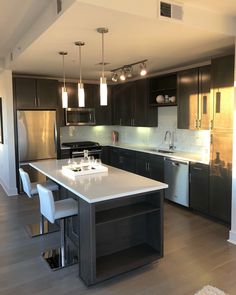 the kitchen is clean and ready to be used for cooking or eating, as well as other things