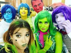 a group of people with different colored hair and makeup