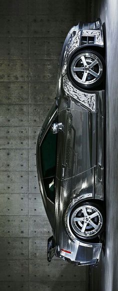 an overhead view of a car parked in a garage