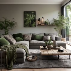 a living room filled with lots of furniture next to a large glass window and potted plants