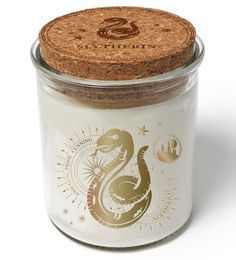 a jar with a cork lid that has a snake on it