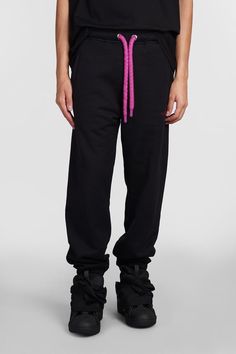 Pants in black cotton, drawstring laces, side pockets, side embroidered logo, back zip pocket , elastic hem, 100% cotton, Made in ItalyGender: MenMaterial: COTTONColor: BlackMade in: FRProduct ID: 406092_RM-TR0066-J155-H24*Import tax/duty will be calculated at checkout (If applicable) Black Joggers With Logo Waistband For Streetwear, Casual Black Pants With Logo Waistband, Black Cotton Bottoms With Logo Waistband, Streetwear Cotton Pants With Logo Detail, Cotton Streetwear Pants With Logo Detail, Black Cotton Joggers With Drawstring, Cotton Bottoms With Logo Detail For Streetwear, Black Tapered Leg Sweatpants With Drawstring, Black Cotton Straight Joggers