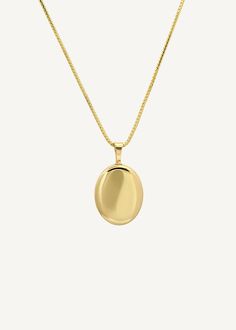 Home is where the heart is. Our Maison Gold Lockets are heirlooms that represent a moment in time. Keep this locket as a family heirloom forever. Wear her blank or get her engraved with your signature letter. To engrave more than one letter, visit HERE.Complete the look with a Rolo Link Chain Necklace or a Box Chain Necklace. Photo dimensions: 14mm x 11.5mmTo add a photo inside, simply open the locket and carefully press the photo into place. Our lockets do not have a separate opening for a phot Gold Lockets, Oval Locket Necklace, Jewelry Locket, Travel Looks, Gold Inspiration, Initial Disc Necklace, Gold Locket Necklace, Pendant Designs, Fall Rings