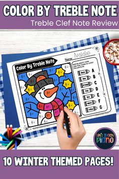 the color by treble notebook is shown with an image of a snowman