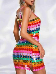 Features of Rainbow Disc Sequin Dress 💖1.A-line SilhouetteThe A-line silhouette of this rainbow disc sequin dress is both flattering and comfortable, gently flaring out from the waist for a classic and timeless look that suits all body types.💖2.Chain Armor and Rainbow Disc SequinsThe captivating combination of chainmail and rainbow disc sequins in this dress embodies the spirit of disco. Chain mail shapes add an edgy glamour, while rainbow disc sequins create a dazzling and dynamic visual effe Carnival Party Mini Dress, Multicolor Disco Sequin Dress For Summer, Spring Disco Sequin Dress, Glamorous Multicolor Sequin Dress For Party Season, Spring Disco Mini Dress With Contrast Sequin, Summer Disco Sequin Dress, Multicolor Sequin Summer Dress, Colorful Sleeveless Mini Dress For Party, Glamorous A-line Mini Dress With Sequins