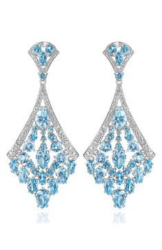 A mix of colors and shapes distinguish polished drop earrings set with sparkling topaz. Total topaz weight: 6.00ct. Sterling silver/blue topaz/white topaz Imported Blue Topaz Jewelry Set, Argentium Silver Jewelry, Blue Diamond Jewelry, Octopus Pendant, Bold Lipstick, Diamond Pendants Designs, Blue Topaz Jewelry, Expensive Jewelry Luxury, Expensive Jewelry