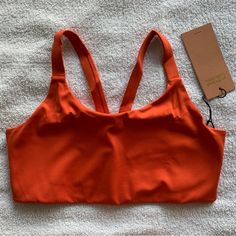 Nwt. Sold Out Color: Tart. Size Medium. Summer Cotton Sports Bra For Loungewear, Orange Sports Bra For Yoga In Summer, Summer Orange Sports Bra, Summer Yoga Sports Bra In Orange, Stretch Orange Sports Bra, Orange Summer Sports Bra, Summer Workout Bra With Adjustable Straps, Solid Color Adjustable Straps Sports Bra For Loungewear, Adjustable Straps Solid Sports Bra For Loungewear