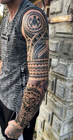 a man with a tattoo on his arm