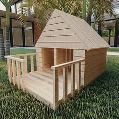 a house made out of wood sitting on top of green grass next to palm trees