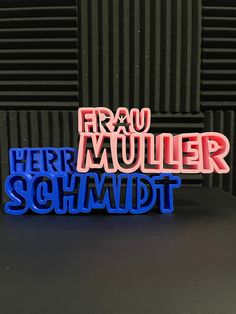 two magnets that say frau muller and herr schmadtt