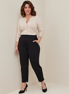 FIT Model is 5'9” wearing size 12. High rise. . Eased through the hip and thigh with a tapered leg. Pull-on elastic waist. Tapered leg hits just above the ankle. . Inseam: 27”. MATERIALS + CARE Studio Luxe Ponte knit fabric: Our signature work (any) wear fabric with office-approved tailoring, WFH stretch and comfort, and curve-loving hold. Plus, it’s machine washable! Stretch level: Maximum. Wrinkle resistant. 68% rayon, 28% nylon, 4% spandex. Machine wash cold. Line dry. Imported. DETAILS Pull- Woman Office Outfit Plus Size, Bisuness Casual Plus Size, Summer Work Plus Size Outfits, Basic Professional Outfits, Professional Outfits Women Size 12, Business Casual Outfits For Heavy Women, Curvy Office Fashion, Slacks For Plus Size Women, Midsize Petite Work Outfits