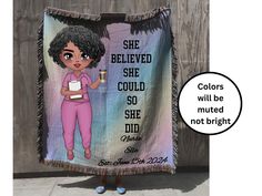 a woman holding up a blanket with the words she beliveed she could so she did not brighten