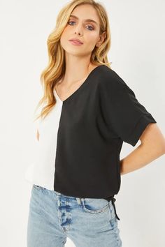 This Curvy Girl V-Neck Colorblock Blouse has you looking stylish and smashing all day (and night) long! Perfect for work-to-date night action, its simple yet stylish design will keep you turning heads without breaking the bank. Draw attention to the V-neck with a statement necklace and you'll be ready to slay and make them say YASSS! Color: Off White/Black Style #: ST3379 Fabric: 100% Polyester Woven Top, Day And Night, The Bank, Stylish Design, Black Fashion, Color Blocking, Date Night, Color Block, Turning