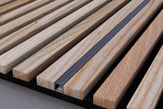 wooden slats are lined up on the floor