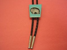 "Gift Idea for Him-Her-Yourself. Affordably Priced! Trending, Latest Fashion, Great to wear to Work, Parties, Concerts, Festivals, Beach, Resorts, Rodeos, Square Dancing and more...., Wedding Neckties, Groomsmen Ties, Western Neckties, Southwestern Buffalo Bolo Tie, Pewter, with Antique Finish. Turquoise Opaque Enamel Border Color, Adult 36 TO 42 inch, Black or Brown, Vinyl Leather like Cord, Kids Black 28, 30, or 32 inch lengths available, Tension bolo back slide, easier to use and helps protec Tie Jewelry, Boho Necklaces, Work Parties, Groomsmen Ties, Western Necklaces, Luxurious Fashion, Bolo Ties, Square Dancing, Boho Chic Jewelry