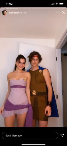 two people in costumes standing next to each other