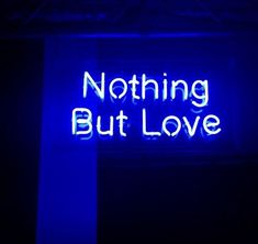 a neon sign that says nothing but love