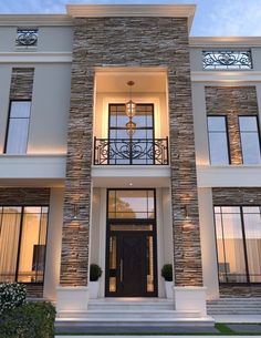 the front entrance to a modern style home