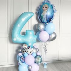 balloons and decorations for a frozen princess birthday