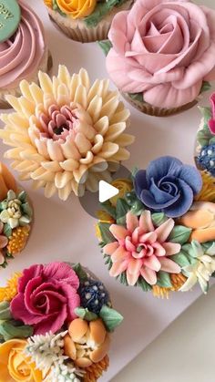 cupcakes decorated with colorful flowers and leaves