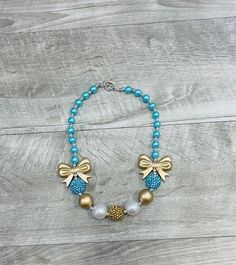 Necklaces are not toys and should not be left with children unattended. Bow Necklace, Pandora Charm Bracelet, Charm Bracelet, Necklaces, Turquoise, Toys, Gold