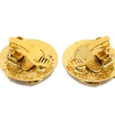 pair of gold plated cufflinks with hands on them