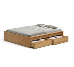 a bed with two drawers underneath it