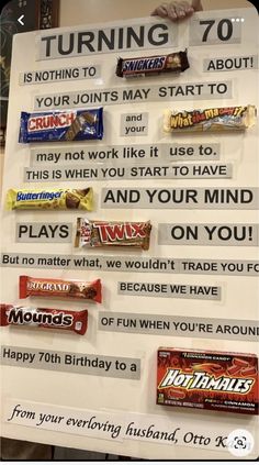 a sign with candy bars on it that says, turning 70 is nothing to do