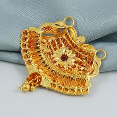 22k Gold Jewelry For Festivals Gift, 22k Gold Filigree Jewelry As Gift, Yellow Gold Plated Jewelry For Diwali, 22k Gold Filigree Jewelry Gift, 22k Yellow Gold Jewelry For Diwali, Yellow Gold Round Pendant Jewelry For Diwali, Elegant Yellow Jewelry For Puja, 22k Gold Jewelry With Flower Pendant For Wedding, Ornate 22k Gold Jewelry Gift