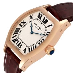 Cartier Tortue XL CPCP Collection Rose Gold Mens Watch 2763 W1546051. Manual winding movement. Cartier Calibre 9601 MC. 18k rose gold Tonneau shape case 48 mm x 38 mm. Octagonal crown set with a faceted sapphire. Sapphire exhibition case back. 18k rose gold bezel. Scratch resistant sapphire crystal. Silver guilloche dial with blued steel apple-shaped hands and black painted Roman numeral hour markers. Minute markers around the inner rim. Brown leather strap with 18k rose gold deployant clasp. Classic Cartier Chronograph Watch Accessories, Classic Cartier Watch Accessories With Chronograph, Classic Cartier Chronograph Watch, Classic Cartier Watch With Subdials, Cartier White Business Watch, Luxury Cartier Analog Watches, Classic Cartier Chronometer Watch, Cartier Chronograph Watch For Business, Cartier White Watches With Subdials