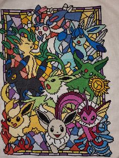 a cross stitch pattern with many different pokemon characters on it's back and sides