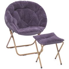 a purple chair and foot stool sitting next to each other